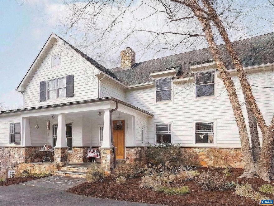 Nestled privately overlooking Blue Ridge views, this totally custom 5 bedroom 4.5 bath Arts & Crafts farmhouse is truly a remarkable offering built by the current owners who spared no expense creating this unique residence. From the beautiful heart pine floors to the incredible dry laid stonework at the massive family room fireplace to the wonderful bluestone terrace  & Buckingham slate covered patio & screened-in porch overlooking the views, there are wonderful, timeless finish details at every turn. The 3 car garage is accessed via covered breezeway. A small creek runs along the back of the property. Other noteworthy features incl' an expansive 1st floor primary, whole house generator, fiber internet, and 4 HVAC zones w/ hydrothermal heating w/ ultra-high efficiency gas fired boiler. The large mudroom has sink & built-in cubbies. Flooring incl' heart pine, Buckingham slate & marble.  Other notable extras include a wet bar, extensive wainscotting & built-ins incl' window seats. The kitchen showcases completely custom, solid wood cabinetry, honed granite counters, 48" fridge, Wolf gas cooktop w/ commercial hood, warming drawer, double ovens & wooden center island. Please see the detailed list of features in the documents tab.,Granite Counter,Wood Cabinets,Wood Counter,Fireplace in Family Room