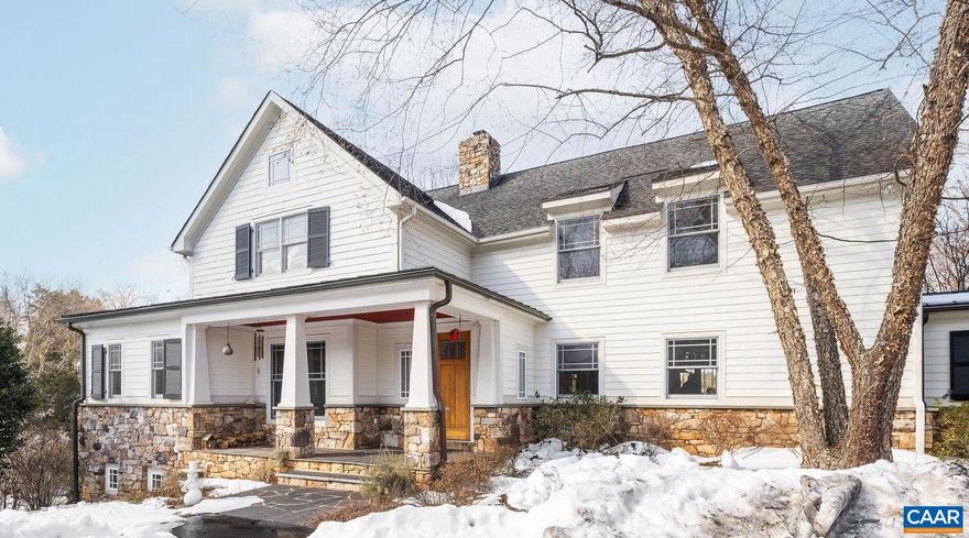 Nestled privately overlooking Blue Ridge views, this totally custom 5 bedroom 4.5 bath Arts & Crafts farmhouse is truly a remarkable offering built by the current owners who spared no expense creating this unique residence. From the beautiful heart pine floors to the incredible dry laid stonework at the massive family room fireplace to the wonderful bluestone terrace  & Buckingham slate covered patio & screened-in porch overlooking the views, there are wonderful, timeless finish details at every turn. The 3 car garage is accessed via covered breezeway. A small creek runs along the back of the property. Other noteworthy features incl' an expansive 1st floor primary, whole house generator, fiber internet, and 4 HVAC zones w/ hydrothermal heating w/ ultra-high efficiency gas fired boiler. The large mudroom has sink & built-in cubbies. Flooring incl' heart pine, Buckingham slate & marble.  Other notable extras include a wet bar, extensive wainscotting & built-ins incl' window seats. The kitchen showcases completely custom, solid wood cabinetry, honed granite counters, 48" fridge, Wolf gas cooktop w/ commercial hood, warming drawer, double ovens & wooden center island. Please see the detailed list of features in the documents tab.,Granite Counter,Wood Cabinets,Wood Counter,Fireplace in Family Room