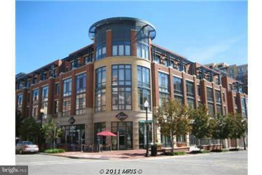 Light Filled Loft-Style condo in Old Town Alexandria - 4 blocks from King Street Metro. Hardwood Floors throughout. Floor to Ceiling Windows in Great Room.  Kitchen has Granite and Stainless Steel. Washer and Dryer in unit.  GARAGE PARKING!! Gorgeous Courtyard.  Right out the door are Shops, Restaurants, STARBUCKS. Great "In the City" life style.  Small pet allowed.  Furnishings in the condo can be left in place for an additional monthly fee of only $200.