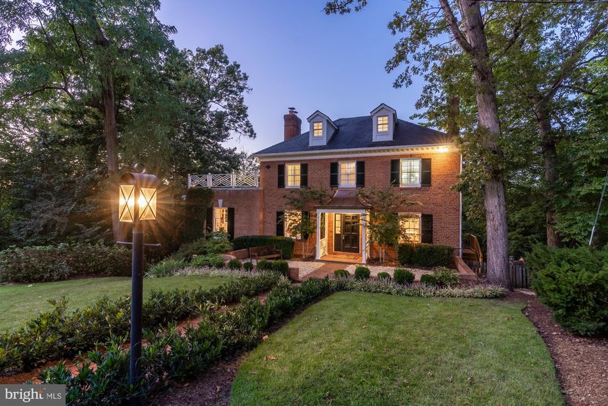 Presenting an updated 1953 classic brick Colonial sited in a quiet enclave of luxury residences. Located on a cul-de-sac this comfortable home offers spacious room sizes, elegant design and a versatile updated floor plan.   Enter through the foyer to access the main level living areas and staircase to the upper level. The first floor includes a gracious Great Room with wood burning fireplace, unique and updated light fixtures and attractive crown molding. There is a formal dining room with a gleaming chandelier, built-in cabinetry and elegant moldings. Additional spaces on this level include an updated and spacious kitchen with adjacent dining area, private screened porch and convenient powder room. This updated kitchen features quartz counter tops, stainless steel appliances including a six burner Commercial Viking stove with separate grill, abundant white cabinetry and counter space. Gleaming hardwood flooring on the main level, handsome built-ins and recessed lighting combine to create a welcoming atmosphere. Upstairs you will find three large bedrooms plus two updated bathrooms- ensuite is the Primary Bedroom. Graciously outfitted with plantation shutters, abundant closet space and hardwood floors, the bedrooms provide plenty of space for comfort.  Additionally there is a third level finished space with updated full bathroom- perfect for an office, playroom or overflow bedroom space. Completing the home is a functional and beautiful finished lower level recreation room with fireplace and attractive sconces and recessed lighting, two additional bedrooms with two more updated full bathrooms, an exercise/ play room and a pristine laundry area. Lots of work at home spaces!!! Walk out from this level to the covered rocking chair porch and further outdoors to the rear stone patio with lush plantings. With two levels of terraced flat back yard there's room for great entertaining! Welcome to everything the Belle Haven neighborhood has to offer including a nearby marina, Country Club, bike path, access to the scenic Potomac River waterfront and the many shops and restaurants of Old Town Alexandria