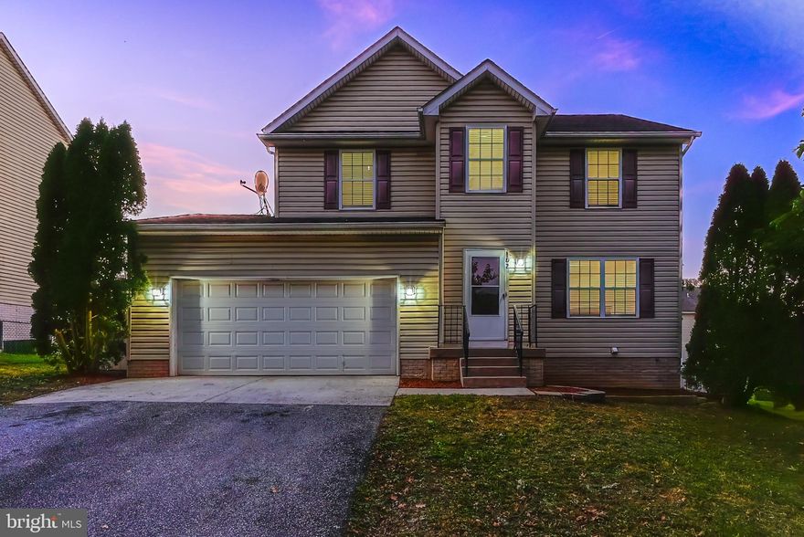 Welcome home to this spacious 4 Bedroom, 3.5 Bath Colonial ideally located on Martinsburg’s West End—just minutes from the I-81 King Street exit and within walking distance to the Foxcroft Avenue shopping area. Built in 2005 and offering approximately 2,760 finished square feet, this home combines comfort, convenience, and functionality.

The main level features hardwood flooring throughout the foyer, living room, and dining areas. A gas fireplace provides a warm focal point in the living room, while the adjoining kitchen and dining spaces offer easy flow for everyday living and entertaining. Upstairs, the primary suite includes a walk-in closet and a private full bath with dual vanities, a soaking tub, and a separate shower. Two additional bedrooms, a hall bath, and LVP flooring complete the upper level.

The finished basement expands the living space with a full bath and three additional rooms—one with direct means of egress—providing versatility for a home office, guest suite, gym, or media space. Outside, enjoy a fenced rear yard, deck, and stone patio—perfect for outdoor gatherings or quiet relaxation. Conveniently located near shopping, dining, and commuter routes, this well-maintained Colonial is ready to welcome its next owner.