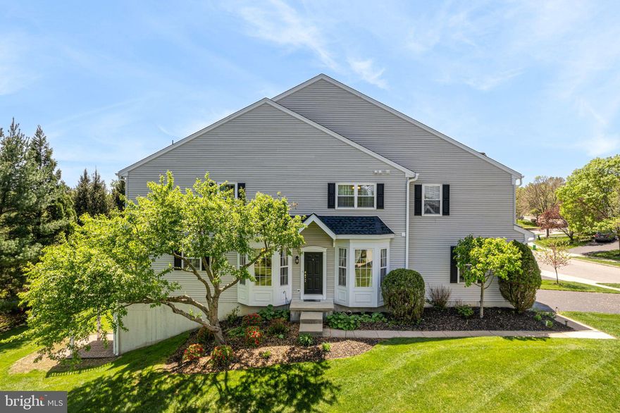 This bright, spacious, and impeccably maintained luxury end-unit townhome in Greenbriar offers comfort, style, and convenience. Freshly painted and move-in ready, the home features a warm and inviting interior filled with natural sunlight. Enjoy low-maintenance living in a beautifully cared-for setting. The main level showcases gleaming hardwood floors, a grand two-story great room with a gas fireplace, and an upgraded kitchen complete with 42" cabinets, granite countertops, stainless steel appliances, a breakfast bar, and a sunny breakfast area. Sliding glass doors lead to a new deck (2023), perfect for peaceful outdoor relaxation. An updated half bath (2023) completes this level. Upstairs, you'll find three generously sized bedrooms, all with hardwood flooring, ceiling fans, and ample closet space. The updated hall bathroom (2023) and convenient laundry room enhance everyday living. The spacious owner's suite features a walk-in closet and a luxurious en-suite bathroom with a dual vanity, stall shower, and large jetted tub. The finished walk-out basement offers abundant natural light and includes a large storage area. Additional highlights include a two-car garage with a Tesla charger and numerous recent upgrades: new hardwood flooring on the second floor (2023), new recessed lighting (2023), new air conditioner, HVAC, and water heater (2020), a new roof (2023), and freshly painted primary bedroom and bathroom (2024). The affordable HOA fee covers lawn care, snow removal, roof and gutter maintenance, waste services, and common area upkeep. Conveniently located near shopping, restaurants, healthcare facilities, parks, and walking trails. Don’t miss the opportunity to own this beautifully updated and meticulously maintained home!