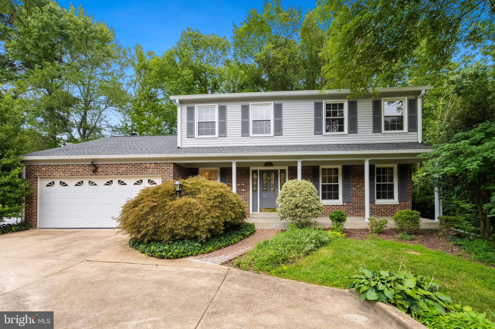 Beautiful 4 bedroom 2.5 bath colonial in sought after Orange Hunt Estates West. Immaculate home. Pride of ownership shines throughout! Updated eat-in kitchen with granite counters, quality stainless steel appliances, hardwood flooring & custom maple cabinets. Large living & dining rooms have gleaming hardwood flooring, crown molding & chair railing. Family room off kitchen with hardwood flooring, wood burning fireplace, ceiling fan, two skylights, vertical blinds & walkout to deck. Four large bedrooms on upper level. Gorgeous master suite has plush carpet, ceiling fan, dressing area with dedicated vanity & huge walk-in closet. Updated master bath with granite topped vanity, tile flooring, jacuzzi tub & walk-in shower. Upper level hall bath updated with granite topped vanity. Finished basement boasts huge storage area & large recreation room with walkout to back yard. Private back yard that backs to trees. Huge deck. Great for entertaining! Large front porch. Two car garage. Located on quiet cul-de-sac. Recent updates include: Roof, appliances, HVAC, paint, light fixtures & more! Incredible location close to shopping, restaurants, Fairfax County Parkway, I-95, Burke Lake Park, VRE, Ft Belvoir & more! Lake Braddock HS pyramid!