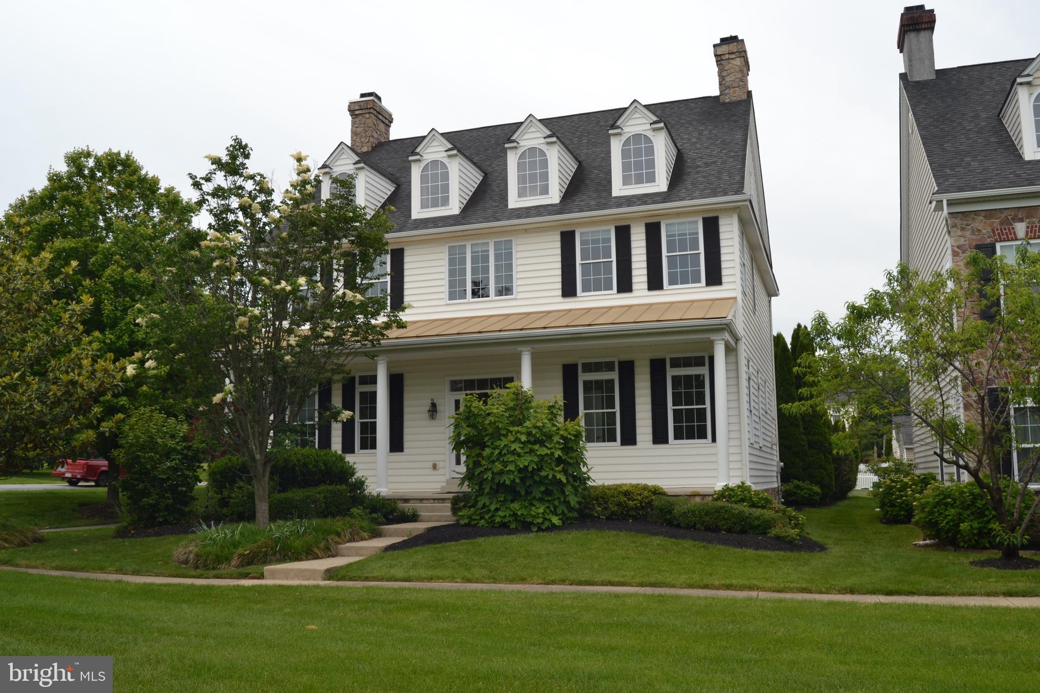 Nestled in the hills of Southern Chester County you will find the modern village of New Daleville. This neo-traditional community boasts walking paths, open space and playground areas. This home is the former sample home for the neighborhood and boasts all of the bells and whistles! Inside the front door of this stately home you find the wide entryway with hardwood floors. To the right is a first floor bedroom/office/den and a full bath. To the left is a large dining room with an attached butler's pantry with tons if cabinets and counter space. Straight down the hall from the foyer is the huge family room with a propane fireplace, morning room and large eat-on kitchen with stainless appliances, center island and tons of 42" cabinets. Off of the kitchen is the rear entry into the home with a mudroom and laundry area. The entire first floor boasts 10' ceilings. Upstairs are the sleeping quarters with 9' ceilings. The owner's suite has two walk-in closets, a seating area and a roomy bath with glass shower enclosure, jetted bath tub, two vanities and separate water closet. There are three additional large bedrooms and another full bath on the second level. The full basement provides tons of storage or space to expand your living space. There is a detached two-car garage and is adjacent to a 37 acre township park with a walking trail.