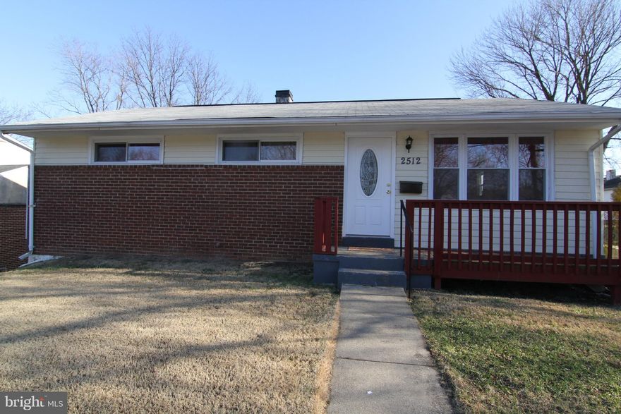 Rambler Home updated through in 2014 and well maintained with 5 bedrooms 2 full baths. Newwer Central AC, newer furnace, newer  kitchen cabinetsand newer appliances.  Basement has kitchenet, full bathroom, walk out,  2 bedrooms, large living area, can be used as in-law suite. Lond driveway for private parking and street parking. Convenient to shopping, highway, and close to Andrews Air Force Base.