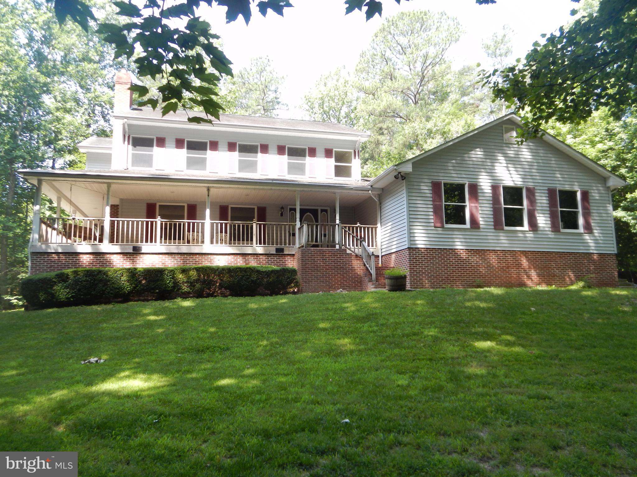 Sitting on over 3 acres, this beautiful home is located in a very quiet neighborhood on a dead-end street. Loaded with cherry cabinets, hardwood floors and spacious rooms, this 3 Bedroom, 2.5 Bath property has an unfinished basement perfect for storage. The oversize two car garage has plenty of shelves. The master bedroom suite features a walk in cedar closet and full bath. Separate zone heat pump system per floor. Heat pump as a gas backup that will turn on the gas burner when the temperature drops below 40 to optimize efficiency. The house contains 6" outer walls and high efficiency windows.