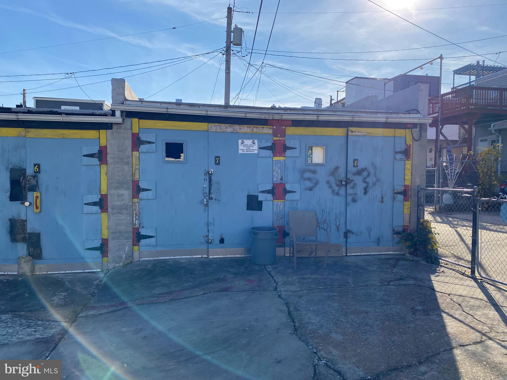 8 storage garages ready for a new owner. Great opportunity in Brewers Hill with so much new construction in walking distance. Gated access to North facing units off Fleet St. could offer several private parking opportunities as well. Alley access to South facing units off Fagley or Grundy St. Start bringing in cashflow! Property does not have any known utilities.