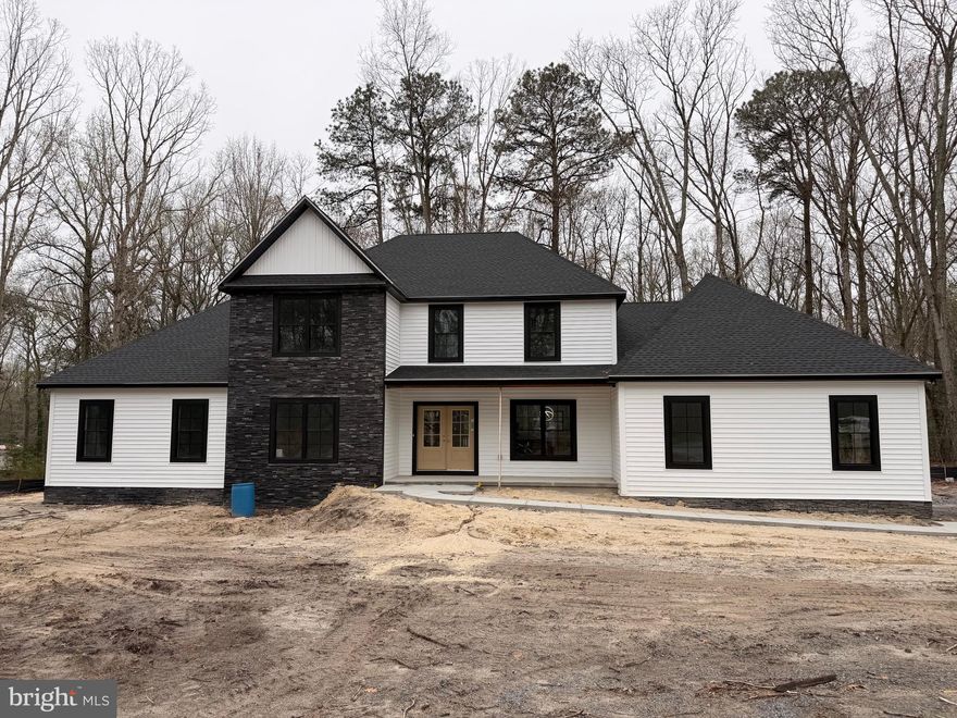 Welcome to luxury living in one of Lewes's most established and sought-after communities. This stunning SunRen Homes custom build is anything but cookie-cutter>>> every detail has been thoughtfully designed to stand apart. With the interior 90% complete and the exterior finishing touches wrapping up over the next few weeks, now is your opportunity to tour and still choose your own finishes, making this 4-bedroom, 3.5-bath masterpiece truly your own. Situated on a generously sized lot, the possibilities are endless, add a pool, pool house, mother-in-law suite, or outdoor entertainment area and create the lifestyle you've always envisioned. The HOA is well-established with low fees, and Delaware's famously low property taxes mean more of your money stays in your pocket year after year. Location is everything, and this home delivers. You're just minutes from Cape Henlopen State Park, where 5 miles of shoreline meet both the Delaware Bay and the Atlantic Ocean, perfect for swimming, fishing, hiking, and biking. Rehoboth Beach and its mile-long boardwalk are just down the road and Delaware Seashore State Park's 2,018 acres of Atlantic Ocean and bay beaches are within easy reach as well. Whether you're a nature lover, water sports enthusiast, or simply love coastal living, it's all right outside your door. Don't miss this rare chance to own a one-of-a-kind luxury home in a prime Lewes location. Schedule your private tour today, your Delaware dream home awaits!