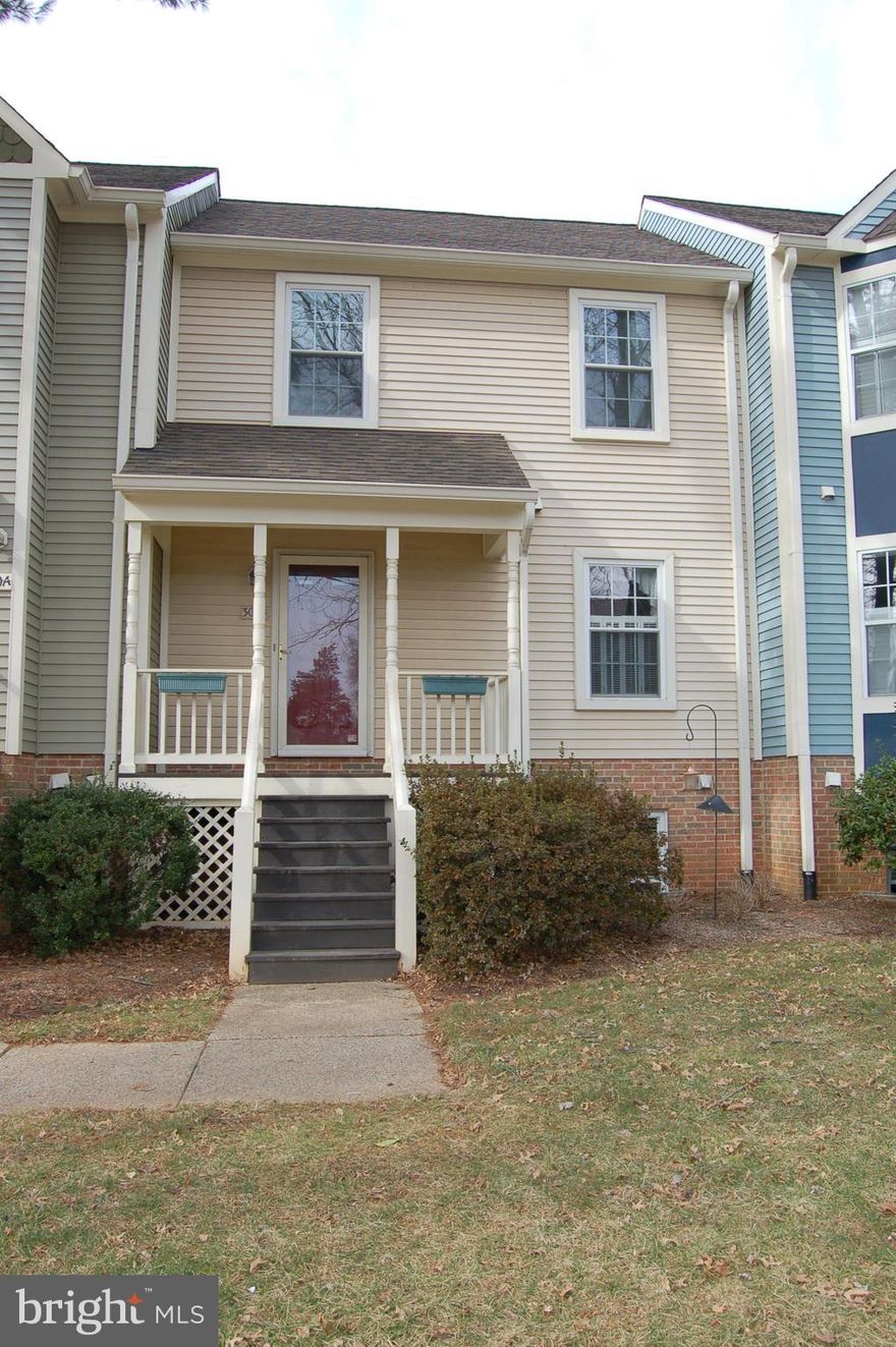 Townhome-style 2 lvl condo, WALK to Vienna Stores/Shops/Restaurants (1 BLOCK) 2 miles to Tysons, 3.5 miles to I-66/Vienna Metro! Washer/Dryer in Unit. Hardwood Floors throughout main level. Living Room walks out to deck. Upper level features, 2 spacious BR's & 2 Full Remodeled Baths (2015). Rear Bedroom is suite with Private Bath. HUGE 20'x8' floored attic with pull down stairs for storage! Lawn Maintenance included. 1 Assigned off-street parking space behind home, guest parking, and plenty of street parking.