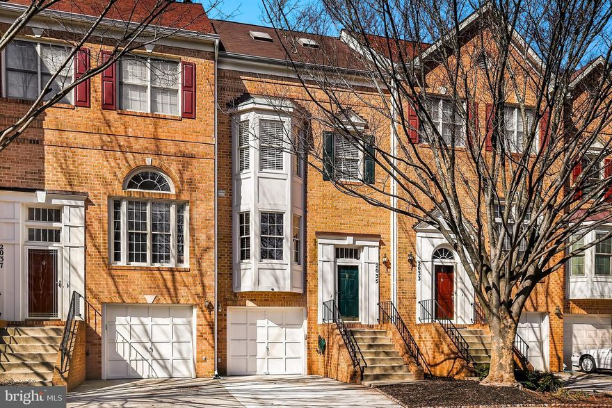 The one you’ve been waiting for! This elegant brick home with a bump-out and garage is perfectly situated in a tree-lined neighborhood just minutes from the Metro.  Enjoy hosting in the bright, airy living room featuring soaring ceilings and expansive windows, or take the party outside to the deck overlooking peaceful green space. Unwind in the spacious and private primary suite complete with its own en-suite bath. This home is completely move-in ready with fresh paint, new carpet and new kitchen appliances. As an added bonus: the entire home has been fully re-plumbed with all copper piping. Don’t wait—this gem won’t last long!