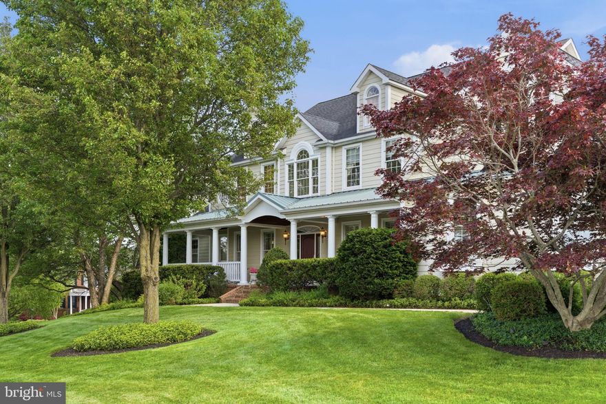 Set on a picturesque 1.126 acres, this custom-built home in the MANOR OAKS/BRIAR KNOLL Community is masterclass in craftmanship, architectural detail and refined luxury.  The large Southern-style front porch greets you as you step into the grand two-story foyer with sweeping staircase and impeccable millwork.  Flanked on both sides of the foyer are a formal dining room and formal living room, featuring Southern-style shutters, nine-foot ceilings, and hardwood flooring. 

At the heart of the home is the gourmet kitchen designed for both entertaining and functionality, featuring a large central island with a cooktop and indoor grill, vegetable prep sink, and warming drawer.  Custom cabinetry with practical storage and glass-front display cabinets surrounds throughout, as well as Italian tile flooring.  The kitchen features a breakfast room with a gas fireplace, a bar with a wine refrigerator and wine rack, a walk-in pantry, and a dedicated desk area with an abundance of cabinet space.

The great room is a showpiece highlighted by soaring two-story ceilings, a Juliet balcony overlook, dramatic coffered ceiling, and expansive windows that flood the space with natural light.  The wood-burning fireplace with custom raised-hearth and mantle creates both warmth and visual impact.  

The main level also features a large office with hardwood flooring, a laundry room with utility sink, and the primary suite with cathedral ceilings and a gas fireplace with custom mantle.  The spa-like master bath is exquisitely appointed with upgraded tile, heated floors, a jetted two-person bathtub, and a fully customized steam shower complete with dual shower heads, integrated bench seating, and full-body water jets, delivering a true at-home spa experience.  Dual walk-in closets and thoughtfully designed display shelving complete the suite, while French doors open to a private balcony for seamless indoor-outdoor living.

The upper level can be accessed by either the front or back staircase, and includes four generously sized bedrooms, large walk-in closets and three well-appointed full baths, as well as a large versatile bonus room above the garage. 

Outdoor living is equally exceptional with three covered porches, a bluestone patio off the great room, and beautifully landscaped grounds featuring mature trees and exceptional privacy.  The large rear yard is fully fenced and a storm door off the kitchen to the back yard has a built-in dog door.  The yard was also designed to include plenty of space for a future inground pool.


Additional highlights include a three-car garage with additional storage, a lower level with double walk-out doors and windows and plenty of expansion potential, a first floor powder room, Anderson windows and doors, dual-zone heating and cooling, propane cooktop and indoor grill, a Rheem Marathon electric water heater ensuring uninterrupted hot water, fully owned 1,000-gallon underground propane tank, and a whole-house water filtration and pH balancing system. 

Lovingly maintained by the origonal owners, this is a rare offering where thoughtful design, premium materials, and timeless elegance converge – delivering a truly exceptional living experience in one of Baltimore County’s most sought-after locations.