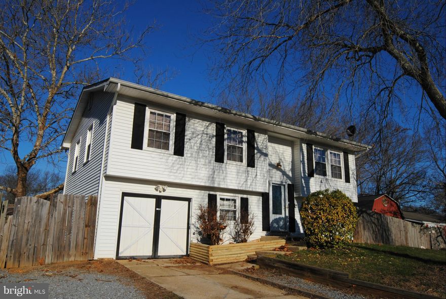 Great space for the money! Fully fenced back yard, 4 bed/2 bath home with recent updates in kitchen and bathrooms, attached garage converted into storage space with widened driveway for additional space.