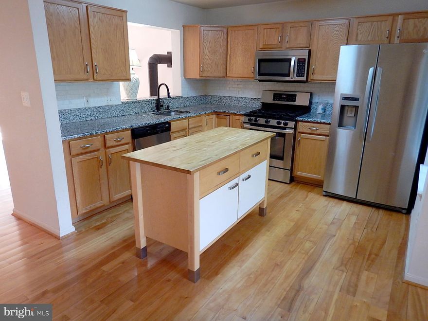 Welcome to the Lake Evesham community and vibrant York Rd. The home is just steps away from the Belvedere Square Market, Senator Theatre, and many other local attractions and destinations. The very convenient location is just 10 minutes from Towson and I-695, and only 5 minutes to the recently revitalized Cross Keys. The  home was built in 2004 and has been well maintained. Great traditional floor plan featuring vaulted ceilings, wood floors, gas stove in the living room, 3 bedrooms and 2 full bathrooms upstairs , walk-in closets, and more. Roof new in 2020. A sliding glass door leads out to the wonderful deck. The kitchen has an island, granite counters, stainless steel appliances, and a lot of cabinet space. The large lower level offers many options for additional living space, storage, or workshop. 1 Year Home Warranty included that covers heating and cooling systems, all appliances, plumbing, electrical, and more. Excellent opportunity!