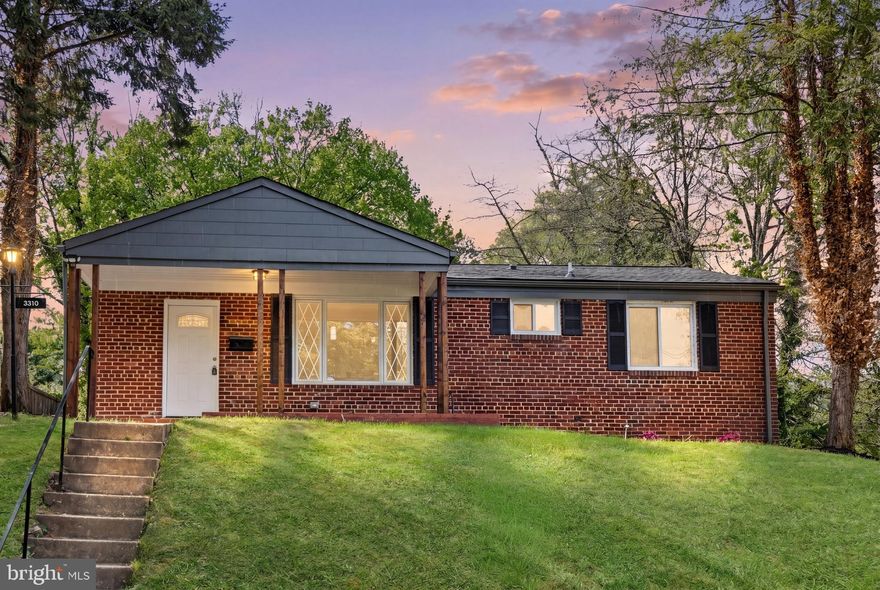 Charming all-brick rambler featuring 5 bedrooms and 2 full baths, filled with natural light and showcasing beautiful wood floors throughout. The bright, airy living room offers a panoramic window, cozy fireplace with dark mantel, brick accent, and a stylish feature wall. The remodeled kitchen is equipped with stainless steel appliances, updated cabinetry, modern fixtures, and great natural light. Both bathrooms have been tastefully updated with sleek finishes and black accents. The spacious finished basement includes 2 bedrooms, a full bath, and a versatile multi-purpose room. Enjoy a covered patio, outdoor storage, and a generous backyard—perfect for relaxing or entertaining.  Conveniently located near major roads, public transport, places of worship, shops, restaurants, UMD campus and much more! Don't miss out!