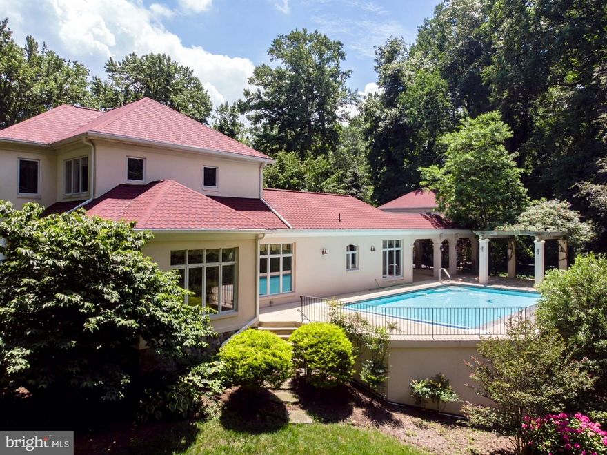 Tax record is wrong, New home constructed in the year 2000 - REDUCED!! BEAUTIFUL HOME WITH CHESAPEAKE BAY VIEW!! Turnkey luxury awaits at 5825 Bayside Road in much sought after Saint Leonard!  This stunning Architectural style of Mediterranean is lined with soft beautiful archways, the finest of finishes, custom detail work and gracious rooms for entertaining even the grandest of celebrations! At 4,063 sq ft this beautiful home offers everything!5 Bedrooms, 3 1/2 Baths on basement and detached 2 car Garage plus a detached 2 Story Apartment at 1008 sq ft for additional family members or possible rental... with 2 Bedrooms, 1.5 Baths, Laundry Room and Patio with separate dedicated septic system. Outdoor living spaces include Covered Porches and Patio with Pergola on Poolside. Wooded Acreage surrounds this corner Landscaped property with beautiful flowering shrubs & trees and a Shrub watering system surrounded by a Horseshoe Black top driveway. Handicapped accessible walkways into the house, arched doorways, ornate columns, large outdoor living areas and spaces with of course an In-Ground 20 x 30 Gunite Swimming Pool with a huge tucked away gated Pool House.  The automatic Pool Cover and Polaris Pool Vacuum convey. Enjoy Beautiful views of the Chesapeake Bay from the Veranda & Balconies, Pool and Bedrooms. Maintenance free Stucco exterior with 12" thick wall construction (6" frame with 6" cinder block stucco veneer).  Dual layer Asphalt Roof Shingles with life time warranty. 10' Ceilings with Crown Molding through out home. Hardwood flooring, Pella doors and windows,Skylights, custom solid Wood Cabinets, Hand hewed solid Wood Ceiling Beams, Vaulted Ceilings, Granite & Marble Counter tops. Custom designed wood burning Fireplace and Floor-to-ceiling curved windows in the Great Rm that accentuate the Panoramic views of the Chesapeake Bay! Custom Solid Cherry Kitchen Cabinets, 36" Viking Gas Range with Grill and Oven,  large Center Island and a Morning room with open view of Swimming Pool. The Library has Custom Solid Wood  Built-in Book Cases, French doors to the Great Room, French doors to Veranda and French doors to the Swimming Pool. You will love this private Oasis setting all year long! A very short walk to the sandy beach and the nearby Marina has boat slips available to dock your boat. This property is not to be missed! Please watch the video!!