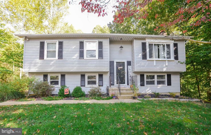 DONT WAIT ON THIS ONE!  Cute as button and ready to move in.  Many Upgrades includes roof, baths, most windows, flooring, paint, ceiling fans and more.  This house includes a 2 Car Garage, Large pavillion in  the back yard, great for parties or more parking.  Hot Tub conveys (as-is), private back yard, deck, NO HOA, a nice location, tucked away, but close to most everything you need.  Don't miss out on this one.