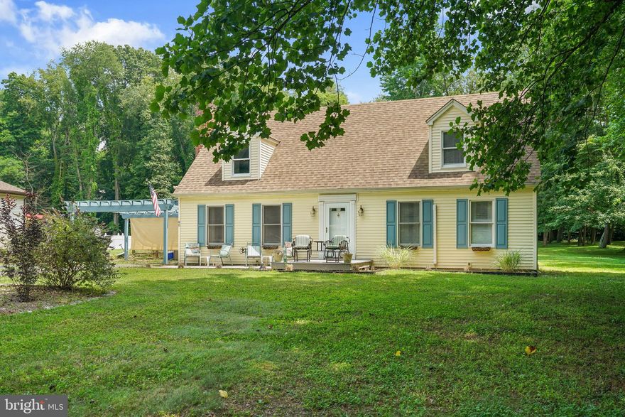 PRICE ADJUSTMENT!!! PRICE ADJUSTMENT!!! This charming Cape Cod boasts 4 bedrooms and 2 full baths, with a spacious 3038 Sq Ft, and sits on a beautiful .71 acre lot with a flat fenced yard that backs to trees. The main level has new LVP flooring and the home features a new HVAC Split Heat/AC system throughout, with a roof that is only 6 years old. Located in a fantastic water-oriented community on the Chesapeake Bay, you can fish, swim, boat, and enjoy a vacation lifestyle right where you live!