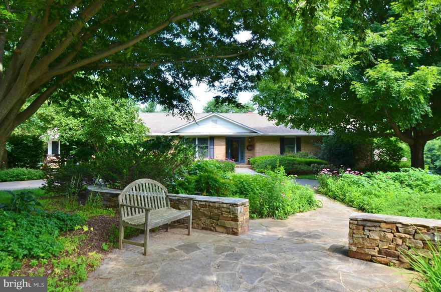 Perfect home for the horse lover seeking privacy and a great location in My Lady's Manor. Located down a long private drive with beautiful scenic vistas. All brick rancher has an open kitchen to family room with vaulted ceilings, wood burning FP, sun room and lg deck. Beautiful stone terrace with stone wall overlooking fenced pastures. 4 stall barn, separate tractor shed, & lovely mature gardens.