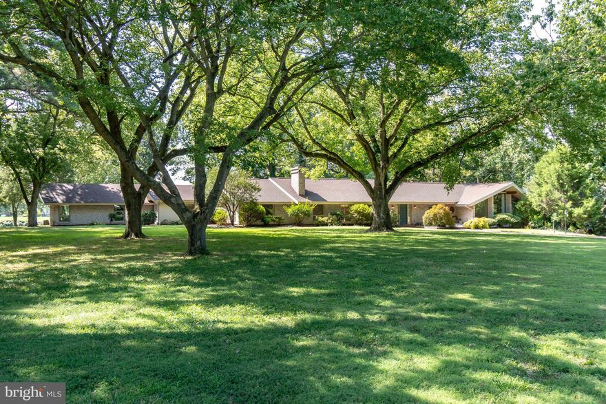 Eastern Shore, 4 bedroom, contemporary  retreat with fabulous views of Glebe Creek off the Miles River. Nestled on a private 1.8+/- acres overlooking the water with high elevation, southern exposure, magnificent  trees, substantial 8 foot wide pier with 2 lifts, electric and water and approximately 4 feet MLW. This extraordinary home was artfully transformed in 2010 with the addition of approximately 1580 sq. feet designed by Christine Dayton.  Total square footage of home is approximately 4126. Boasting two kitchens, 3 1/2 bathrooms, a 2 car attached-garage, and terrific patios, this one-of-a-kind property blends timeless charm with modern elegance. Conveniently located just minutes from Downtown Easton and a jet airport.