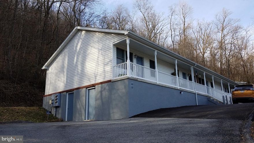 Front porch to set outside in evenings, close to town in Berkeley Springs, walking track 2 blocks from apartment at Widmyer Elementary School and 2 blocks to Berkeley Springs High School to watch the Football games and other sports.  No pets accepted, no smokers accepted.  Nice place to live at end of the road. First unit 116 George Ln, Apt 1. End unit. 
Tenants responsible for electric, renter insurance, ambulance fee  yearly, up front with lease.