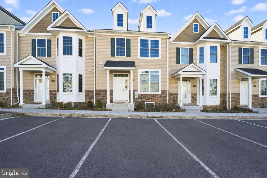This is your chance to own a well-maintained and modern 5-bedroom, 3.5-bath townhouse in a prime Reisterstown location! Featuring modern curb appeal with stone accents and a clean, contemporary facade, this home offers stylish and functional living.
Natural light fills the open main level, where the living area connects smoothly to a spacious, modern kitchen. Rich wood cabinetry, stainless steel appliances, quartz countertops, and a large center island with seating anchor the space. The layout keeps sightlines open from the kitchen to the living room, creating a setting that feels airy and functional. Just off the kitchen, sliding doors lead directly to a private rear deck that overlooks the fenced yard, offering an ideal spot for unwinding outdoors at any time of day.
Upstairs, you’ll find generously sized bedrooms, including a well-appointed primary suite. The fully finished basement is an additional living space, complete with an extra bedroom and full bathroom, making it ideal for guests or multigenerational living.
Conveniently located near Reisterstown Road, with easy access to Patterson Avenue, shopping, dining, and public transportation, this move-in-ready home provides both space and convenience in a vibrant neighborhood.