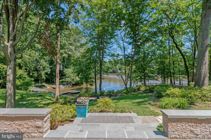 Wow - the perfect waterfront! Lake Barcroft at it’s finest! Private lake community comprised of
1025 homes, 5 sandy beaches, kayaking, sailing, pontoon boating, canoeing, swimming, ice-
skating, fishing and wonderful neighborhood spirit. Fourth of July fireworks, parades, Easter
egg hunts, games, clubs - lots of group activities - all inside the Beltway close to DC! A
wonderful way to live!
This house has been thoughtfully remodeled and lovingly maintained in so many ways. This is
MOVE IN READY! All freshly painted and gleaming hardwoods!Main level is completely open
with vaulted ceiling and large picture windows - exactly what you’ve been looking for! Brick
walled side room for office/den/TV/playroom -cozy!
Primary bedroom suite complete with new bath - beautiful soaking tub - walk in shower, double
vanity - walk in closet with custom built shelves/drawers - sliding barn door and mirrored wood
doors, additional closet, tray ceiling, large picture windows. Also, on this level is an additional
large bedroom and gorgeous hall bath.
Lower level also has fabulous views of the lake - large picture windows, convenient and cute dry
bar, separate laundry room, storage room (neat as a pin) and powder room. Plus additional
living space, with 3 more bedrooms with lake views (office, etc) and hall bath.
Walk out side door and back door to 75’ paver based patio complete with retaining walls,
capstones and lighting - easy for entertaining! Also storage room off the back of the house for
gardening tools, boating equipment, etc. and gorgeous red 8x12’ Tuff shed for storage and
workshop with electricity and lighting.
Additional circular patio in yard with fire pit (added in 2024); recent improvements include
landscaping with flower beds and shrubbery, kayak and canoe stand, lake water
irrigation system to water nearly entire yard (new pump); new pathways with handsome stone steps, 144’ x
4’ board walk, dock (replaced in 2018).
Front yard has super convenient recently paved circular drive, with additional side parking and
street parking spaces created. Stone front walkway to large stone patio leads to new Mahogany
front door.
It’s all been done! Just move in, relax and enjoy a lake front home. This house is in the most
sought after area of the lake! Quiet streets and peaceful setting. Oh and pontoon boat conveys!
Contact listing agent if using as a comp
