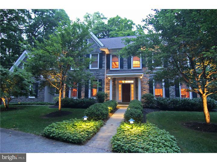 Welcome to 1044 Hedgerow Circle. This custom built home offers plenty of grandeur yet is comfortable enough for relaxed everyday living. Outside, admire the hand cut stone work & intricate flagstone patio, walkways & lush greenery. This distinguished property is located on a quiet & scenic cul-de-sac in Wayne and close to downtown shops, train, golf and more. Inside, you'll find a grand two-story foyer, a formal living room with gas fireplace and gracious dining room with adjacent butler pantry. Every room of this home offers wonderful moldings, built-ins, recessed lighting, in-wall speakers, custom window treatments and much more. The gourmet kitchen features a large center island, loads of cabinetry and all stainless steel appliances including double oven, warming drawer and more. The breakfast room area offers a home work station and French sliding doors to a rear flagstone patio and yard. The great room features a vaulted ceiling, architectural windows, quality mill work, and fireplace. There is a first floor office/study, a rear staircase, with mudroom and attached 3 car garage. The 2nd floor features a master suite retreat with a sitting room with fireplace, built-in window benches, his/her walk-in closets and bathroom with soaking tub and seamless glass shower. Down the hall, you will find three more bedrooms with two full baths, a rear staircase that leads to the first floor mudroom and another staircase up to the 3rd floor bedroom/bath retreat with sitting area. The lower level is full/finished with a custom wine cellar and plenty of room for play, exercise, closet storage and a wall of daylight windows with year-round views of pachysandras and blue skies.
