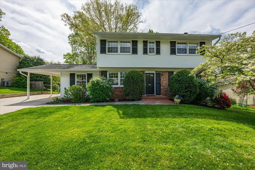 **OFFER DEADLINE NOON TUESDAY 4/30** Classic 4 bedroom, 2.5 bathroom colonial in sought after Stonewall Manor.  Featuring a beautifully renovated kitchen with white cabinets and stainless-steel appliances.  The kitchen has been opened up to the family room and features a peninsula with bar-style seating, perfect for entertaining or informal dining  The adjacent family room includes a custom built-in with storage and opens to the backyard patio.  The spacious living room has a wood burning fireplace, wall of custom shelving that features a built-in work station, ideal for working from home.   Upstairs finds 4 bedrooms including the primary with ensuite bath.  The unfinished basement is a blank slate and can easily be finished as a home gym, recreation room or theatre.  The fenced backyard is complimented by mature landscaping and offers room for dining, playing and relaxing.  Stonewall Manor is just minutes from the Dunn Loring Metro station and the Mosiac District, which offers numerous shopping & dining options and the Angelika Film Center.