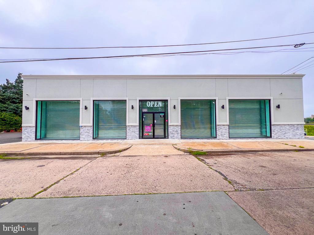 Discover a rare opportunity in a Fantastic Location...for your business to relocate, start up and grow, or add to your investment portfolio in a 16,675± SF retail/flex warehouse building in the heart of Lower Bucks County. Ideally suited for owner-users, developers, or value-add investors, this versatile property features a renovated retail storefront and adaptable drive-in flex/warehouse space. Currently, two active tenants are in place—a dental lab (±2,500 SF) and an auto mechanic (±1,500 SF)—providing immediate, stable in-place income. The remaining 13,000± SF is available for occupancy or lease-up, offering significant upside potential. Located on a scenic waterfront stretch of Bridge Street, this property combines functionality and future development appeal. With excellent access to NJ, I-276, Route 1, and I-95, it is strategically positioned for regional connectivity. Whether you're looking to occupy, invest, or redevelop, 222 E Bridge St presents a compelling commercial real estate opportunity in a high-demand corridor.