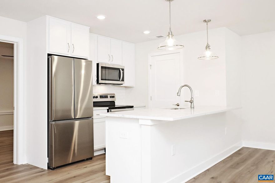 Take advantage of our Fall move-in discount. Sign a lease today and enjoy 50% off your first month's rent! *Income restrictions apply. Please reach out to Braden Property for more details.*  Move-in Ready! This newly built, luxury 1 bedroom, 1 bath end-unit apartment is set within the Galaxie Farm community, located off of Scottsville Rd and just south of downtown Charlottesville. Minutes from shops, restaurants, music and theater venues, 5th Street Station, Thomas Jefferson's Monticello, and the University of Virginia. The community offers a playground, firepit area, stunning mountain views, and easy access to I-64.  This 880 sqft ground level apartment offers luxury vinyl plank flooring, an open living room and dining area, a galley-style kitchen with quartz countertops and stainless steel appliances (refrigerator, dishwasher, oven, microwave), a walk-in pantry, a full bath with tile floors, and a spacious bedroom with a walk-in closet. A stacked front-load washer and dryer are provided. One parking space is available in a nearby parking lot. A lease commitment through Summer 2025 (or 2026) is available. The rent will increase to $1,643/mo on August 1, 2025.  One dog (35lbs max, full-grown) is allowed with fees. No cats.