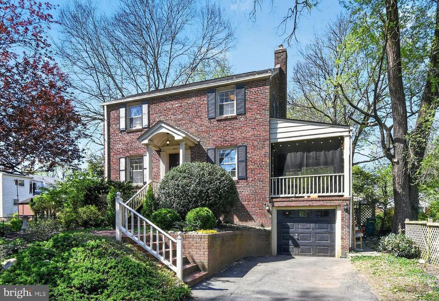 Woodside living at its finest! All-brick Colonial with real character, modern updates, and one of the most convenient locations in Silver Spring.  Be sure to view the 3D Tour! Sitting elevated on a corner lot, this home offers something rare: a detached single-family home just 5 blocks from the Silver Spring Metro (Red Line) and 1.5 blocks from the future Purple Line stop at Dale & Wayne, expected in 2027.
Sun pours through the front windows each morning and fills the back of the house every evening — this home is built for natural light. The renovated kitchen features crisp white cabinetry with soft-close doors and drawers, granite countertops, dedicated pantry storage, and hardwood floors that flow through the main level. Three bedrooms and two full bathrooms, including a brand-new upstairs bathroom, provide a comfortable space.  The fully finished walkout basement is a true bonus — a spacious family room with its own full bathroom and separate exterior entrance, perfect for guests, a home office, au pair suite, or rental income. A screened-in side porch off the main level gives you a three-season space for morning coffee or evening downtime.  Systems are up to date: newer HVAC, a one-year-old hot water heater with an oversized tank, and central A/C throughout. The one-car garage adds convenience, and the backyard is notably larger than most in the neighborhood — with real potential for an addition, expanded parking, or even an accessory dwelling unit.
The location speaks for itself. Walk to Silver Spring International Middle School and Sligo Creek Elementary. One block to Nolte Park and Bullis Park. Steps to Whole Foods, the Fillmore, AFI Silver Theatre, and all of downtown Silver Spring. This is Woodside living at its best — classic bones, modern comfort, and a neighborhood that's only getting better.