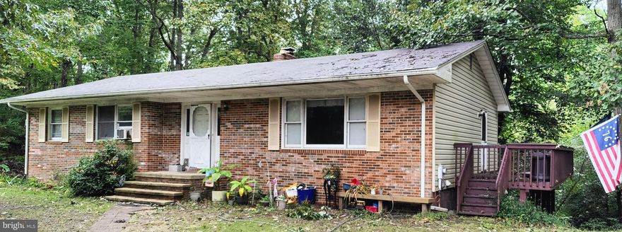 Needs some TLC, nice 4 bedroom 2 bath home on a large .82 acre lot.  Large deck overlook woods.  Fully finished basement with small bedroom and wood burning fireplace.  Home is being sold AS IS (Short sale)