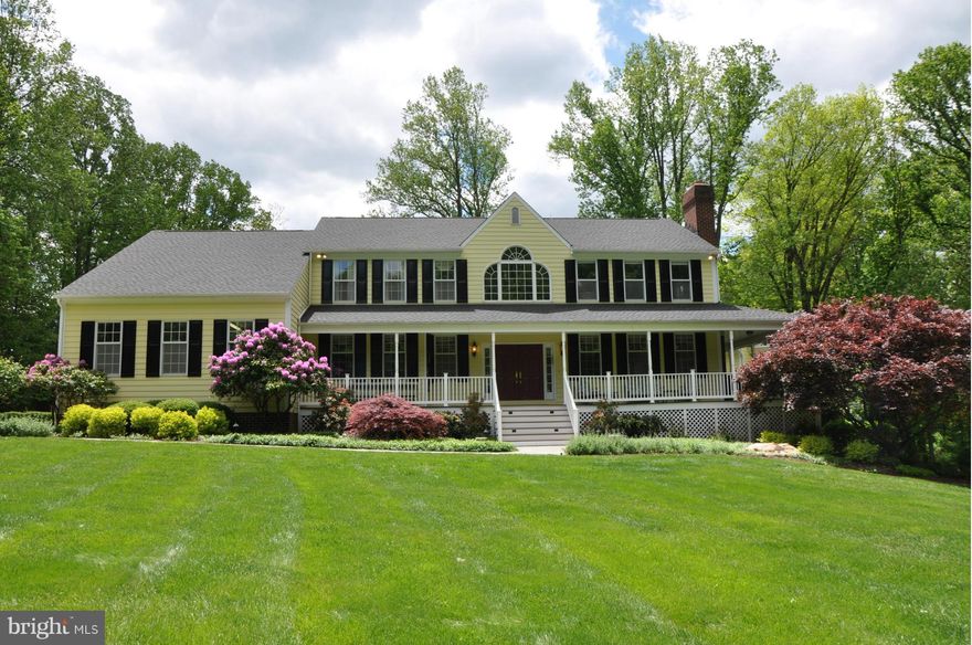 Custom built with all the bells and whistles and over 7400 sq. ft. of living space. Wrap around porch with mahogany floors overlooking 4.5 acres of a partially wooded lot. Gourmet kitchen with spacious breakfast room and wet bar. Authentic diner and bar lounge in the basement. 3 zones of heating/cooling that have been updated.  In law suite w/ full kitchen and separate entrance.