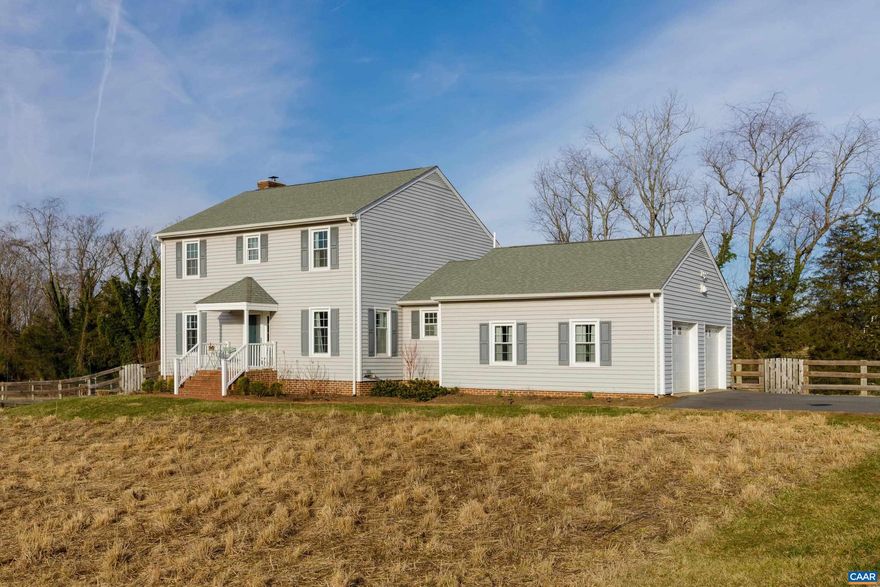 Situated on a lovely 2-acre parcel, framed by a wild-flower meadow, lush grassy fields & mature trees, this freshly remodeled home stands out. Conveniently located just 1 mile from Ivy Creek/Rivanna Reservoir/close to Stonefield, this property combines tranquility with accessibility. The state-of-the-art custom kitchen (stainless appliances/ quartz island/cabinetry); is both thoughtfully designed & skillfully executed. The flowing floor plan seamlessly connects the kitchen to the great room & sunroom. There's a spacious mud/laundry room including tons of cabinetry creating the functional drop-zone w/an oversized garage. At the front of the home, there is both a dining room and a separate living room. Upstairs, are oak hardwood floors in all 4 BRs tying in the two levels. The walk out basement expands the living area, including a cozy den/office, w/ additional bright unfinished space with many possibilities.  Some more recent updates include a  paved driveway (2020), water heater (2021), main level HVAC system (2019) & full installation of meadow (2022). The deck, which is both private and scenic connects the home w/the amazing outdoor space--raised beds, blackberry/raspberry/blueberry/grape plants/ fruit trees & expansive yard!