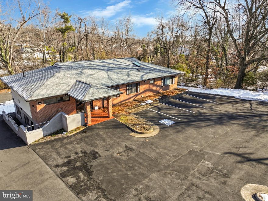 Exceptional opportunity to own a well-maintained, free-standing commercial building in the heart of Woodbridge, VA. This versatile property is ideal for a veterinary office, medical practice, professional offices, or daycare center. The building currently has one tenant, with the main level featuring multiple rooms configured for medical office use, including a welcoming reception area with abundant natural light and a private office for the receptionist. The lower level has a separate entrance and offers additional professional office space, with recently renovated bathrooms and kitchen. With endless possibilities for office configurations, ample parking, and a prime location just minutes from US Route 1 and Interstate 95, this property provides both convenience and accessibility for businesses and clients alike.