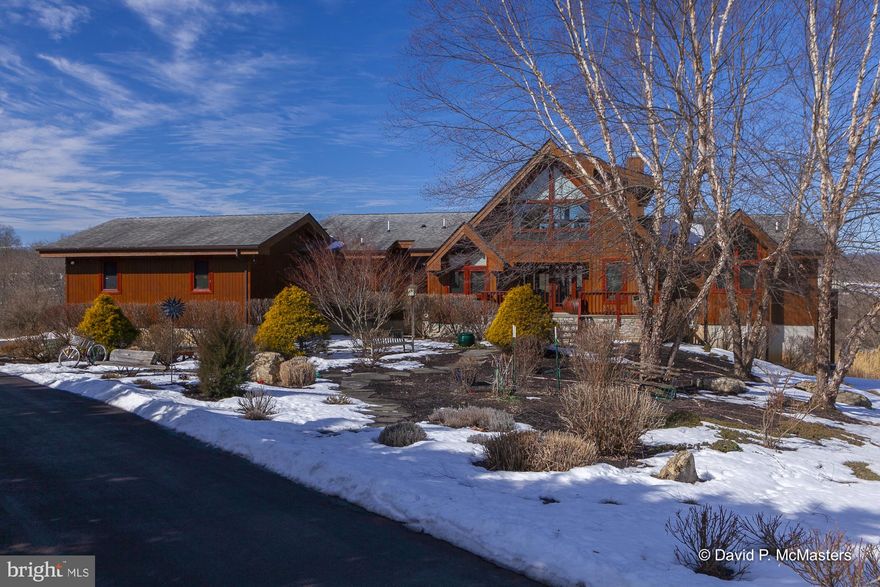 Large dramatic Lindal cedar home on 6+ acres including a burbling winding  stream. Crossings on the Potomac, a gated community,  is one of the best big lot subdivisions in the Panhandle. It has a private marina, gorgeous Potomac River or mountain views around each bend, and low HOA fees.  HIGH SPEED INTERNET- WORK FROM HOME.   This privately sited home at the foot of a cul-de sac is peaceful and beautiful.  The  home features great architecture and cedar construction, lovely views,  most including the stream, from the huge prow  windows and spacious rooms with vaulted wood ceilings.  1 master suite on main level with 2 more on lower level.   Gourmet kitchen.  Subzero + other high end appliances. Wood  and tile floors, gorgeous granite counters, big decks, whole house stereo and much more. Even a connected solar array and  an E-automobile  charging station in the attached 2 car garage. The front landscaping is lovely, and the rear has been maintained to allow nature to show its stuff while still maximizing the winding stream views. 3 FP,, 1st floor MBR suite. 2 MBR suites lower level.  Covered and wrap decks.  Community  boat slips  on the deep water Potomac available. Stream views from almost  all rooms!  Immaculate, well maintained, home. Convenient location with  EZ access to I-81, and I-70.  Close to MARC  commuter train to DC from Martinsburg.   If you love nature... If you need a private yet convenient location... If you would enjoy living in a work of art...If you are looking for a  peaceful and beautiful setting with views...  If you enjoy a stream,  fields and mature trees...  If you enjoy beautiful sunsets...  If you appreciate high quality construction If you enjoy boating on the Potomac River...  this home is for you.    See VIDEO TOUR