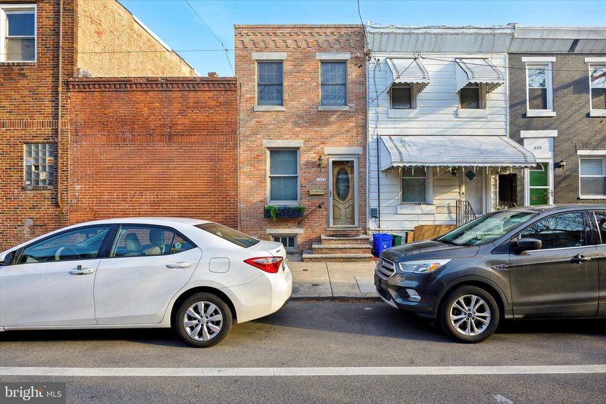 Welcome to 229 Tasker Street. This is a newer rehab in Pennsport. This delightful 2-bedroom residence boasts pristine original cherrywood hardwood floors throughout the first floor, exuding warmth and character from the moment you step inside.   Stainless steel appliances and granite countertops in the kitchen with a generous back patio in the rear of the home. Upstairs you will find an upgraded tiled bath with whirlpool tub, and multi spray heads in walk-in shower, as well as two spacious bedrooms.   Located in the vibrant community of Pennsport, this home offers the perfect blend of urban convenience and neighborhood charm. Explore nearby parks and enjoy a quick jog by the Delaware Riverfront. Dine great restaurants and coffee shops like Moonshine, Rebel and Wolf, Herman's Coffee, Cake and Joe, Creme Brûlée, and Aroma on 3rd Street.