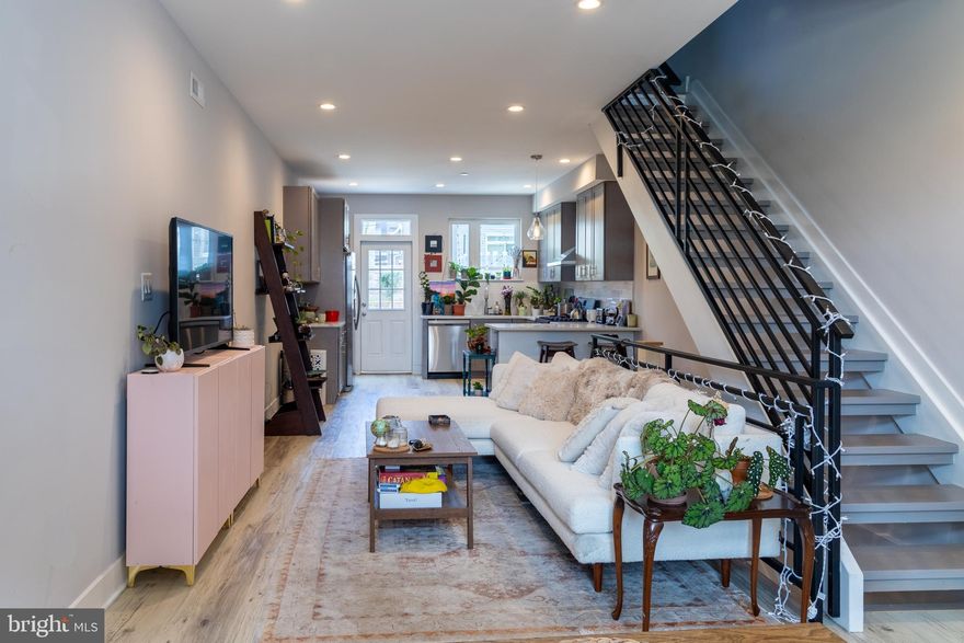 Welcome to your next home in the heart of Brewerytown, one of Philadelphia’s most vibrant and rapidly growing neighborhoods. Built in 2019 and owned by just one owner since, this 4-bedroom, 3-bath residence blends modern construction with timeless design, showcasing a classic brick façade and five years remaining on the tax abatement to help keep your property taxes low. The first floor offers an open-concept layout with generous living and dining areas that flow seamlessly into a bright, contemporary kitchen designed for both everyday living and entertaining. Just off the kitchen, a private backyard enclosed by a wooden fence creates the perfect space for grilling, hosting, or relaxing with friends. Upstairs, the second floor includes two spacious bedrooms, a full bathroom, and a convenient laundry room, while the third floor is dedicated to the primary suite—a private level featuring a walk-in closet, sitting area, plenty of natural light, and an en-suite bathroom with a dual vanity. From there, step right up to the full roof deck showcasing sweeping skyline views, ideal for morning coffee or evening drinks. The finished basement expands your living space with a projection-screen setup, full bathroom, utility room, and a fourth bedroom or office. Parking on the block is generally easy, and the home sits among a friendly community surrounded by beautiful newer builds. You’re close to local favorites like The Boody Mutt, Bad Brother, Rybrew, and Baby’s Kusina + Market, with Whole Foods, Giant, Target and Aldi nearby for all your shopping needs. Priced to sell, this Brewerytown home delivers the space, charm, and lifestyle you’ve been waiting for.