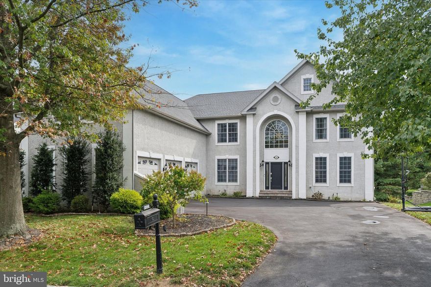 Welcome to the prestigious gated community of Rivercrest, where luxury and convenience meet to create an elevated living experience. Residents of the friendly Rivercrest community enjoy amenities galore, including a pool, gym, clubhouse, walking trails through a 50-acre nature preserve, and comprehensive HOA services. The adjacent Rivercrest Country Club offers a wide range of memberships to suit your lifestyle, so you can enjoy everything from social gatherings to a challenging round of golf.  This estate home is nestled on a premier lot, with unobstructed views of the 9th hole. Spacious, immaculately maintained, beautifully renovated in a modern luxe style, and an effortless floor plan that is a dream for entertaining. This expansive home includes 4-5 bedrooms, 4.5 bathrooms, over 6,200 SF of living space, including a massive walk-out lower level...this area has flex space for an office or 5th bedroom/ in-law suite as it has its own full bathroom! Far from cookie-cutter, you will find many special features and crisp attention to detail, featuring over $200,000 in post-construction upgrades and over $200,000 in Toll Brothers upgrades, plus a newly renovated kitchen!  Entering the home, you’ll notice the luxurious feel of the 2-story foyer, and dramatic curved staircase. The entire first floor boats gorgeous hardwood flooring and fantastic natural light.  Chef or not, you’ll fall in love with the NEWLY renovated kitchen, featuring: ​Slate colored cabinetry with crown molding, quartz counter tops, high-end stainless appliances, and a center island where everyone will gather during holiday parties.  The light-filled sunroom is the ideal place to enjoy breakfast with a view.  Walk out to the oversized deck to find your favorite entertaining & relaxing space.  Back inside, the open floor plan lets you flow effortlessly from kitchen to living room, where you’ll be impressed with a modernized gas fireplace, new custom wine cellar, and a wall of windows.  The dining room has plenty of space to entertain family & friends, and features crown molding & wainscoting. The adjacent living space can be used as a lounge, a playroom, etc. Before heading upstairs, don’t forget to check out the private office.  The second floor is where you will find the impressive Primary Suite you've been hoping for. Your own spacious retreat, complete with large sitting area, 2 walk-through closets, & tray ceiling. The private en-suite bathroom has a large soaking tub, custom dual sink and vanity and a large stall shower with dual heads. Down the hall, a Junior Suite with its own full bath would be a great option for a teen or visiting in-law. Bedrooms 3 and 4 share a jack and jill bath. All bedrooms feature walk-in closets. The massive, walk-out finished basement offers a full bath, a full bar with refrigerator and sink, a separate TV viewing area, workout room/5th bedroom and a playroom. Additionally, there is a large storage area in the basement which complements the huge 3.5 car garage. Walk out of the daylight basement onto the expansive patio with outdoor fireplace and enjoy sunset views of the fairway and the rolling hills beyond! Nothing for you to do, but move right in and start enjoying this wonderful home & community! Don't miss the video tour and aerial drone video.  This isn’t just your next home, it’s the lifestyle upgrade you’ve been waiting for!