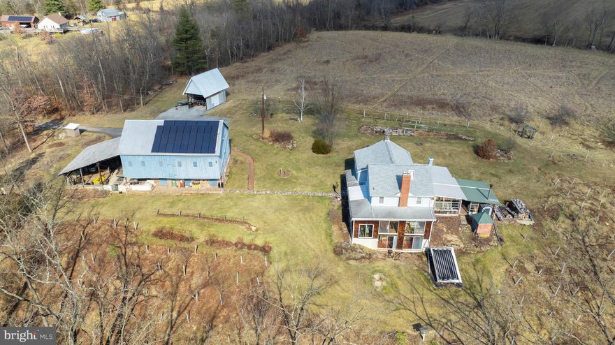 Escape to tranquility with this 3-bedroom, 1.5-bath farmhouse nestled on over 27 acres. This property offers the perfect blend of seclusion and convenience, ideally situated for commuters to both York and Harrisburg, providing a peaceful retreat without sacrificing accessibility. Immerse yourself in nature's embrace with a picturesque creek meandering through the wooded expanse, creating a haven for wildlife and a tranquil ambiance. Whether you dream of equestrian pursuits or seek a hunting and fishing paradise, this property offers ample space and diverse terrain to fulfill your passions. The charming farmhouse exudes rustic appeal, providing comfortable living spaces perfect for family gatherings or quiet relaxation. Take advantage of inexpensive living with solar panels, outdoor woodstove and lower taxes due to being enrolled in Clean and Green. Complementing the farmhouse is a classic 34x37 bank barn with electricity and water, offering versatile storage and potential for various uses. Additionally, a spacious covered 34x30 carport provides ample space for 4+ vehicles and even includes a pit for vehicle work. Enjoy peace and privacy in your own natural retreat, less than 5 mins from I83.