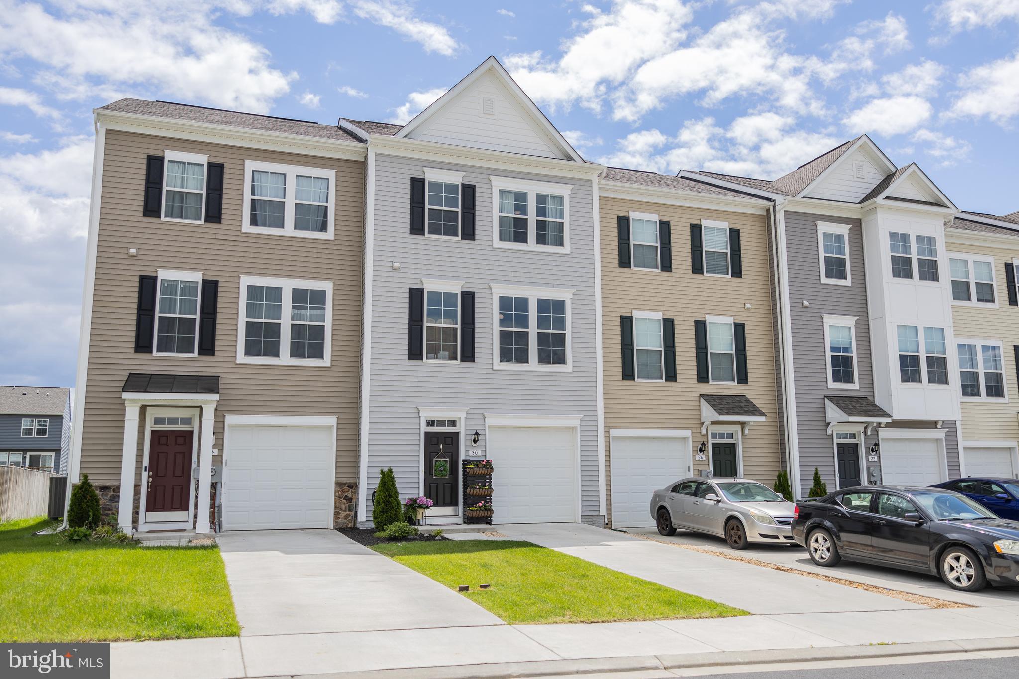 Welcome to this stunning, nearly new townhome situated in McCauley Crossing. The residence features three finished levels. As you enter, you’ll immediately appreciate the modern upgrades the homeowner has incorporated. The first level boasts durable LVP flooring throughout, including a bedroom and a full bath. Step outside to enjoy your fully fenced backyard, which provides a private retreat. Moving upstairs, the LVP flooring continues onto the second level, where an open-concept layout makes entertaining effortless. The kitchen is outfitted with stainless steel appliances and elegant quartz countertops, complemented by a cozy half bath on this floor. Ascending to the third level, you'll notice the continuation of LVP flooring on the stairs. The primary bedroom includes a generous walk-in closet, while the bathroom features a double vanity and LVP flooring. This level also hosts two additional bedrooms and another full bathroom, with the convenience of laundry located nearby. Don't miss your chance—this property is a must-see!