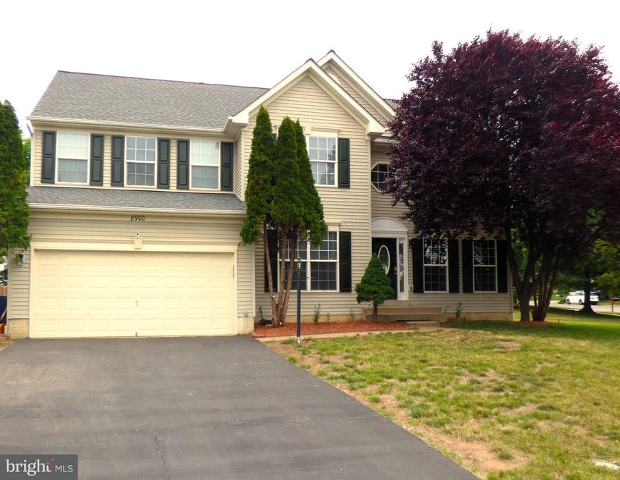 This charming Colonial home, built in 2002, offers a perfect blend of comfort and style. Step inside to discover a spacious, open floor plan adorned with hardwood, new carpets and new kitchen floor. The inviting two story family room has a gas fireplace and flows seamlessly into the eat-in kitchen featuring an island, pantry, and ample table space-ideal for gatherings. Enjoy the luxury of a primary suite with a soaking tub and walk-in shower, complemented by three additional bedrooms and well-appointed bathrooms. Outside, the corner lot boasts a beautifully landscaped yard with a deck, perfect for entertaining or relaxing. The community amenities include a pool, tennis courts, and walking paths, enhancing your lifestyle. With a fully finished basement and an attached two-car garage, this home meets all your needs. Both the primary and upstairs hall baths are new this year!  Recent updates are main HVAC 5 yrs, second HVAC 2 yrs both are Infinity Systems, roof 5 years, new front door, new Kitchen floor, new carpet. Recently updated sliding door and basement door. House has recessed lights, large walk down deck with Gazebo and radon system. Great location and neighborhood!