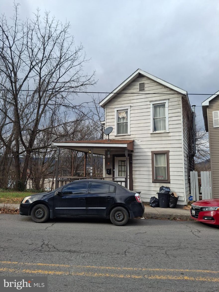 With 896 sq. ft. of living space, this twin/semi-detached home offers two bedrooms and one full bath in a functional layout. Built in 1885, the property is a handyman special located in the desirable South End near downtown, restaurants, and grocery stores. This fix-and-flip opportunity offers strong value-add potential for investors looking to renovate and resell. Convenient location and solid layout make this an excellent opportunity to enhance value and maximize returns. Property sold as-is.