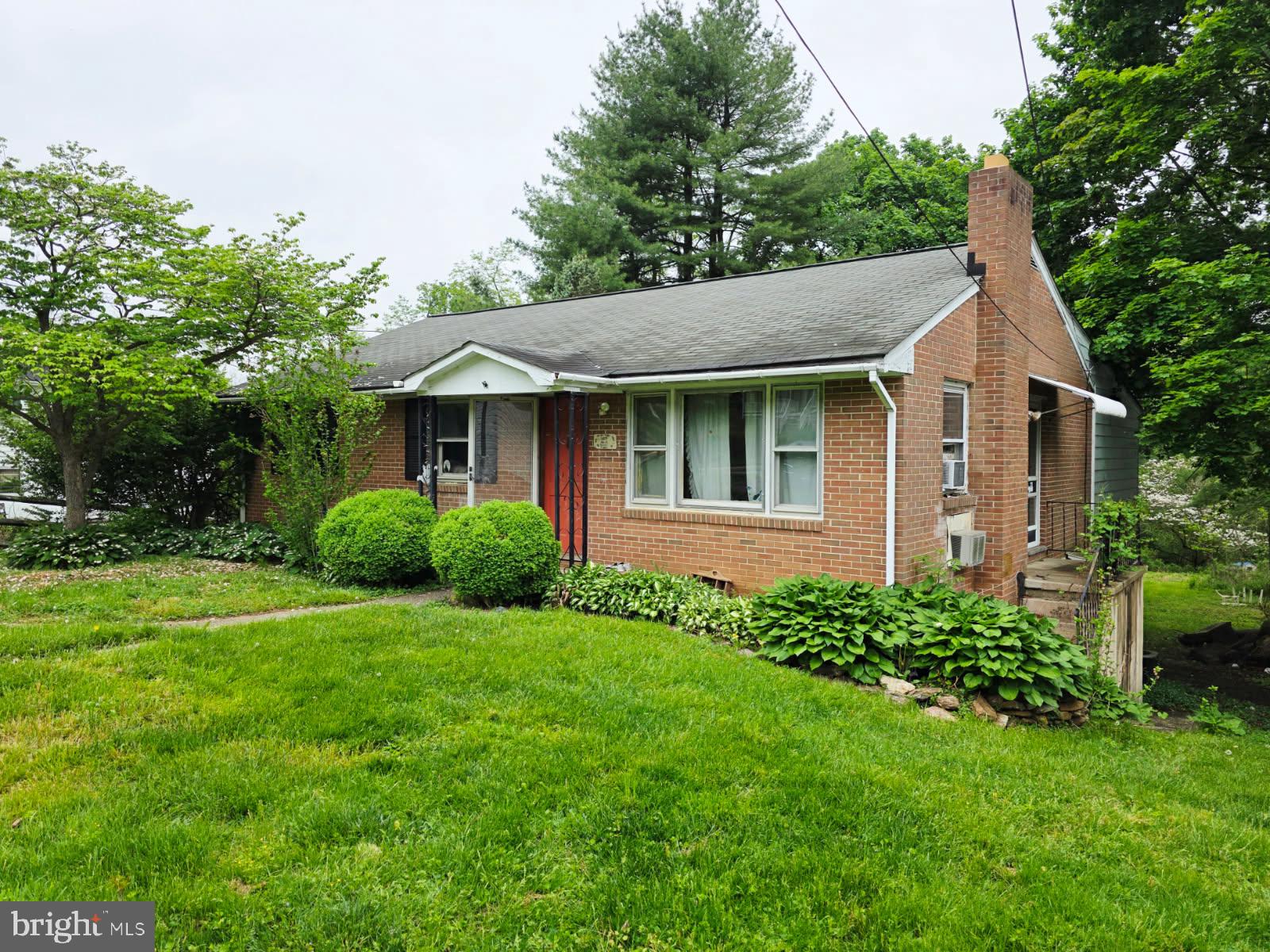 SELLER IS OFFERING A $5,000 SELLER CONCESSION to go toward Buyer's Closing Costs or Home Improvement/Repairs. This is an Excellent Investor Opportunity or someone with a vision! Located in the heart of the charming Delta Boro, this property has so much potential as it is zoned as Village Center Residential so it can be used for Residential or Small Business Commercial. Note: Buyer would need to do their own due diligence regarding zoning specifications if seeking for commercial use. There is driveway parking in front and driveway parking plus a 1 car garage with side access. Upon entering the front main street level, you'll find the living room with large picture windows and original maple flooring that could be shined back to life. From the living room you'll head to the kitchen and then just beyond the kitchen is a huge family room/sunroom that has a beamed ceiling and is flooded with lots of light from all the windows. There are also 3 bedrooms on the main level along with a full bathroom. Downstairs you'll find the laundry room along with another potential bedroom that has an adjacent full bathroom. Oh, and did I mention the huge backyard? What a great location with so many possibilities! Again, this is an "As Is" property, so bring your imagination!