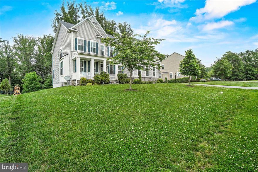 ***Just WOW!- Huge VALUE. Must see with TOP RATED schools, NO CITY TAXES, backs to woods with no through traffic!!  Street ends in cul-de-sac.  Half acre lot! So many extras :-) 
Welcome Home!  This is the one you have dreamed of and waited for. "The Woods" is the most recently developed and high-end area of sought after Spring Ridge. This limited, exclusive section offers larger, partially wooded lots for privacy and natural beauty.  This well-appointed, lovely, home sits on a half-acre and backs to wooded preserve! Enjoy the established landscaping and lush outdoor living from the patio with soothing SPA HOT TUB, the upper deck with a DUAL FIREPLACE, or the charming front porch.  All these vignettes offer a place to truly relax and rejuvenate or entertain.  Despite its youth, this home offers many recent UPGRADES including a huge, finished basement with full bath, living area and 2 rooms.  The Full-sized windows bathe this area with natural light, making it feel like an upper level of the home.  The main level is open concept, with DUAL FIREPLACE also has a bedroom suite so conveniently located next to the spacious mud room off the accommodating 3 car garage.  This home is truly a high functioning gem with logical layout with stately Plantation Shutters and LVP throughout.  Another upgrade is the 2023 ARCHETECTURAL ROOF offering longevity and buffering against winds up to 100 mph. Also upgraded in 2023 are the GUTTER GUARDS, BIRD COVER for the vent, NEW SHOWER and a WASHER/DRYER ensemble located conveniently on the bedroom level.

This stalwart home is where to nurture your love of security, convenience and comfort.   Make this home yours now, and continue the saga of laughter, joy and abundance.  It's time to thrive!  The wonderful community, it's amenities and highly rated Oakdale High school only add to the value!  This community is close to the heart of Frederick, but with NO CITY TAXES!  Some of the perks of Spring Ridge, are the varied community amenities including four pools, a Clubhouse, three tennis courts, a soccer field, two basketball courts, nine playgrounds, over 20 miles of scenic paths and sidewalks, and more than 200 acres of open green space. Set up a private tour today to truly see the quality of living this home offers!