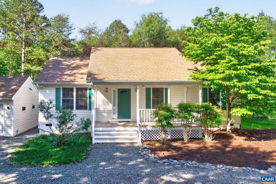 Beautiful single-level living in the gated Lake Monticello community! This sunny vaulted open floorplan offers spacious living and entertaining areas filled with natural light. The oversized kitchen features ample cabinet and counter space, perfect for cooking and gathering. Relax on the inviting front porch or enjoy the private backyard from the rear deck, backing to a peaceful wooded area. The spacious primary suite includes an attached bath and an extra-large walk-in closet with custom built-ins. A detached two-car garage and nicely landscaped yard complete the property. Enjoy resort-style amenities including 5 beaches, golf, fishing pond, tennis courts, basketball courts, and more ? all conveniently located close to dining and shopping.,Formica Counter,Oak Cabinets