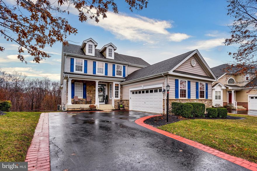 Beautiful Single Family Home in Bulle Rock Where Life Imitates Vacation! This home backs to woods with a great open floor plan. Perfect for entertaining!  Gorgeous vinyl wood flooring has been installed throughout the first floor.    Wide Open Floor Plan!  Perfect for Entertaining!   Very nice Kitchen with new stainless steel appliances.  Large Master Bedroom with a tray ceiling located on the Main Level.  2 Large Walk in Closets.    The Great Room has cathedral ceilings and lovely gas fireplace.   Separate Dining Room is located right off the kitchen.  Two Bedrooms are located on the second level and a full bathroom.  Lower Level has walkout access.    This home won't last long!  Schedule your appointment today!