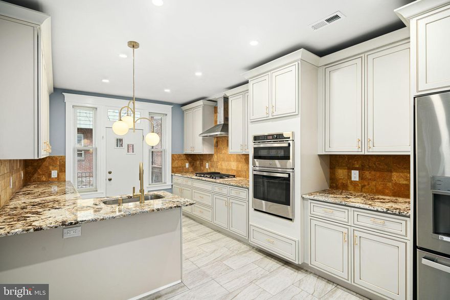 Welcome to your new home! This stunning 4-bedroom, 2.5-bath property combines contemporary design with warm, inviting spaces. The open floor plan on the main level seamlessly connects the living, dining, and kitchen areas, making it perfect for both daily living and entertaining. Gleaming hardwood floors run throughout the home, leading to a charming deck off the kitchen—ideal for relaxation and outdoor gatherings. The property offers both a garage and additional parking for your convenience. A spacious, finished basement with a full bathroom adds versatility, providing extra living space for guests, recreation, or a home office. Situated in vibrant University City, this home is just moments from lush parks, eclectic dining options, and lively cultural attractions. Public transportation is conveniently nearby, making commuting a breeze. Don’t miss this incredible opportunity—schedule your appointment today!