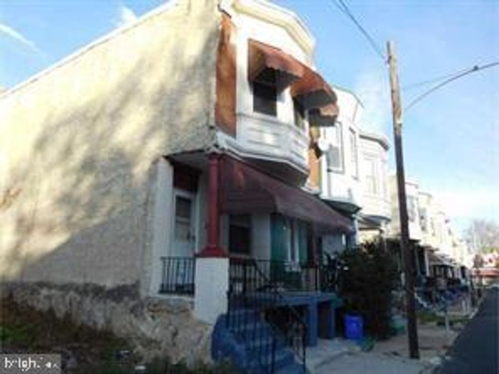 Photo of 2437 W TORONTO ST, PHILADELPHIA, PA 19132 (MLS # PAPH2283276)