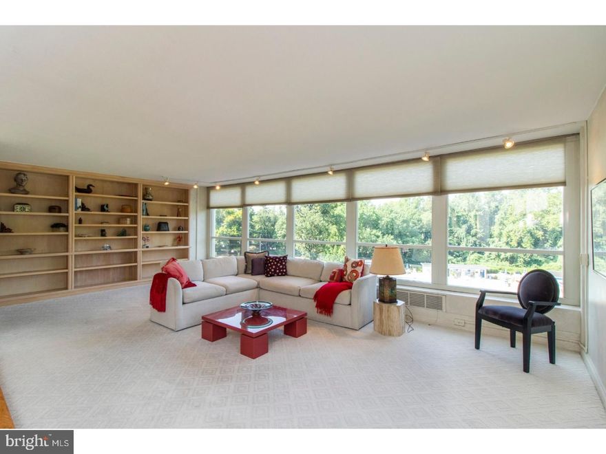 2 Bedroom, 2 Bath, 1814 sq ft condo in sought after Sutton Terrace, located in Bala Cynwyd. Enter through a spacious hallway leading to an open living and dining room.  Custom floor to ceiling bookcases line one wall of the living room.  Wall to wall windows throughout the unit make this a bright and airy home with a truly spectacular pool and garden view visible from almost every room.  The eat in kitchen has a  full size washer & dryer and built in desk.  The  hallway has a large walk-in closet for additional storage. The 2nd bedroom comes complete with custom built in bookcase and desk and a large full bathroom right across the hall. Master bedroom suite has a dressing area and tons of mirrored closets. Electric is ! Prominent doorman building with in-site maintenance, complete Fitness Center, beautifully landscaped pool setting w/cabanas, barbecue area, patios & tennis. Fabulous walk-to everything location is just steps away from train & minutes to 76 & Center City.   Purchaser at settlement pays 2 months condo/special assessment (non refundable)into capital fund and a $2500 move in charge which is refundable after 30 months. Building amenities include fitness center, library, tennis court and pool (extra). Lots of outdoor parking and garage parking for rent when available. Extremely convenient location which is easily accessible by walking to shopping and buses.